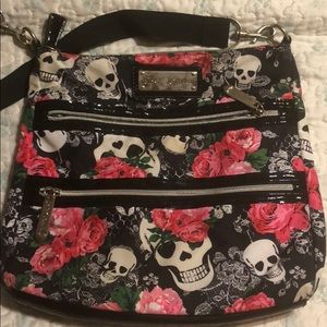 Betsy Johnson messenger bag: skulls and pink roses